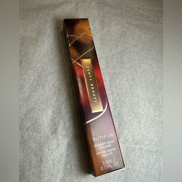 Fenty Beauty by Rihanna Glitty Lid Shimmer Liquid Eyeliner Color: Boozy Bronze - - Picture 3 of 6